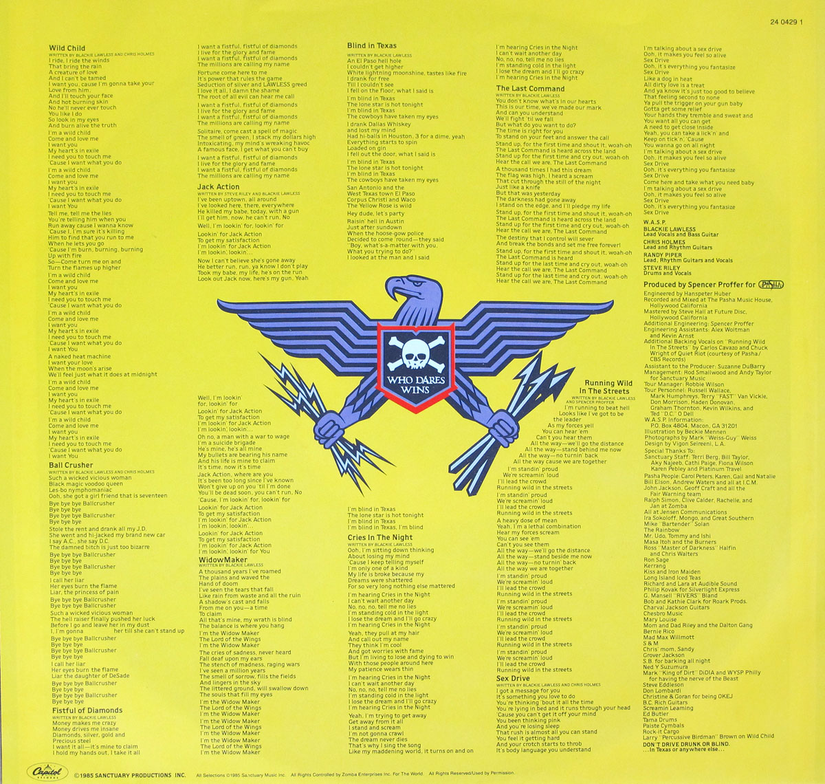 Second custom inner sleeve photo for W.A.S.P. "The Last Command" (12" vinyl LP, Netherlands): a blazing yellow inner sleeve packed with dense, black-printed lyric columns, split into song sections, with a large blue eagle emblem in the center holding lightning bolts and a shield showing a skull-and-crossbones above the words "WHO DARES WINS"; the right side carries the band lineup, production credits, management and tour personnel, plus a long "Special thanks" list, and the bottom line includes the Capitol logo and 1985 copyright/legal text.
